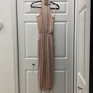 BLUSH NUDE JUMPSUIT. HALTER TOP FULL LENGTH